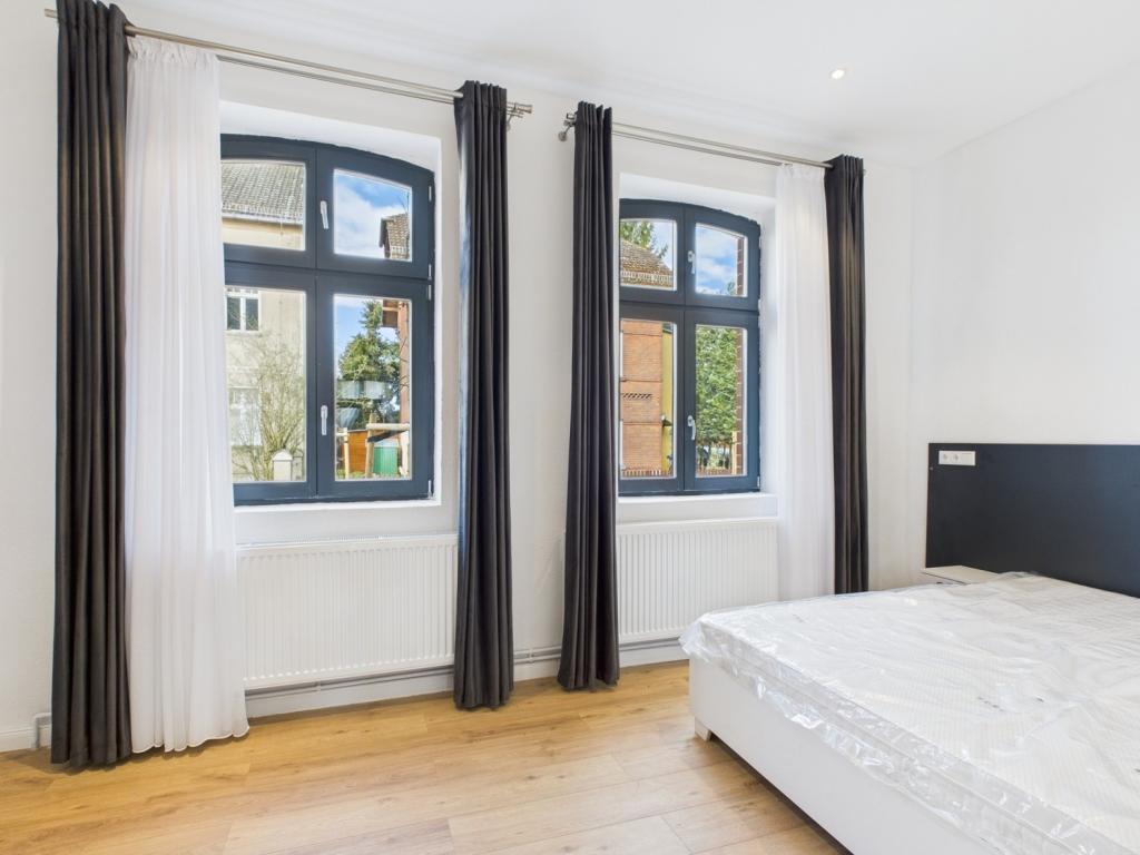 Schlafzimmer mit Doppelbett