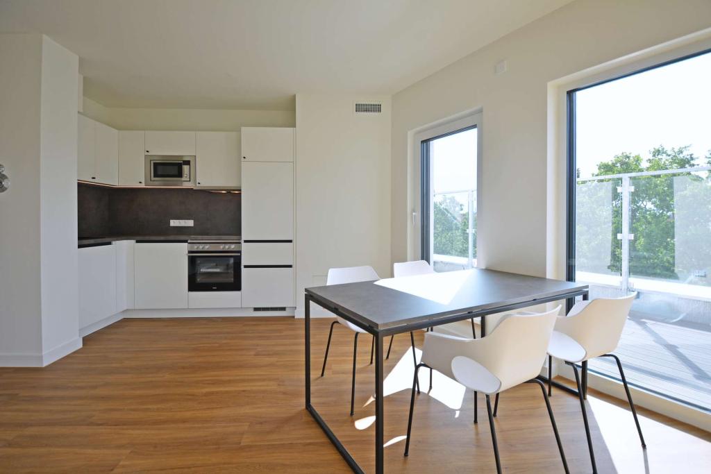 Neubau: Teilmöblierte 2-Zimmer-Wohnung mit Dachterrasse - Foto 4