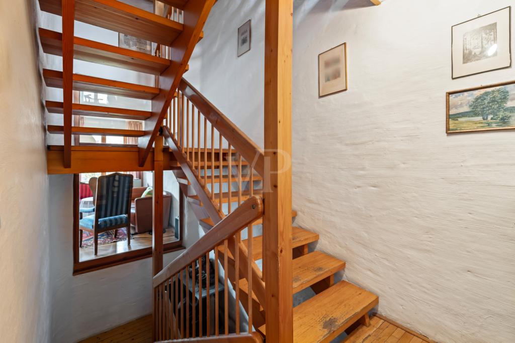 Treppenhaus mit Glaselementen für Tageslicht