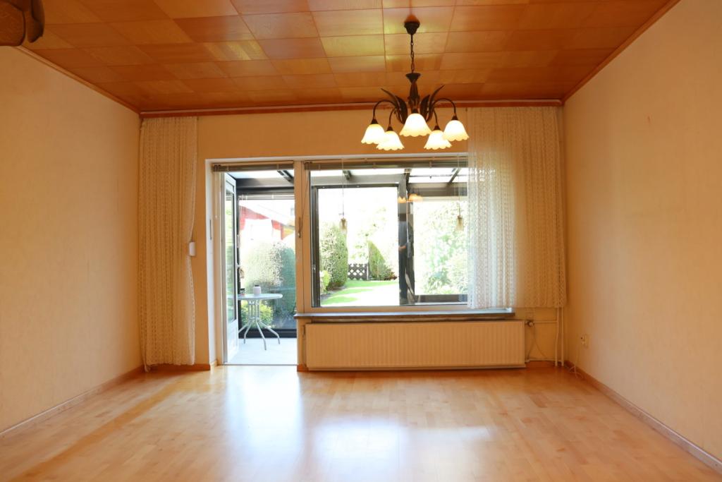 Wohnzimmer mit Wintergarten