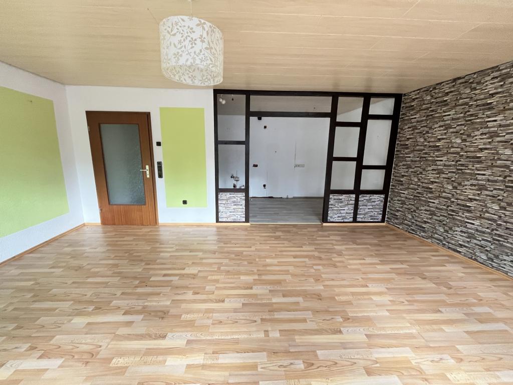 Wohnzimmer mit Küche