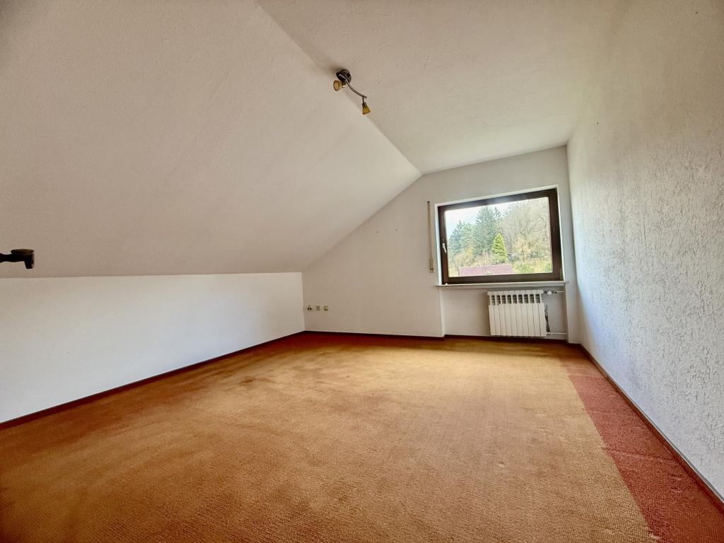 ausgebautes Zimmer im Dachgeschoss 