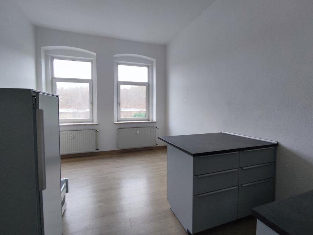 Kleine 2-Zi.-Wohnung mit Einbauküche und Badmöbel! - Foto 2
