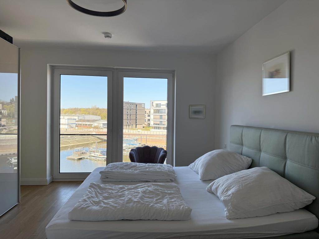 Allerinsel: 2,5-Zimmer-Wohnung mit Einbauküche und zwei Dachterrassen - Foto 4