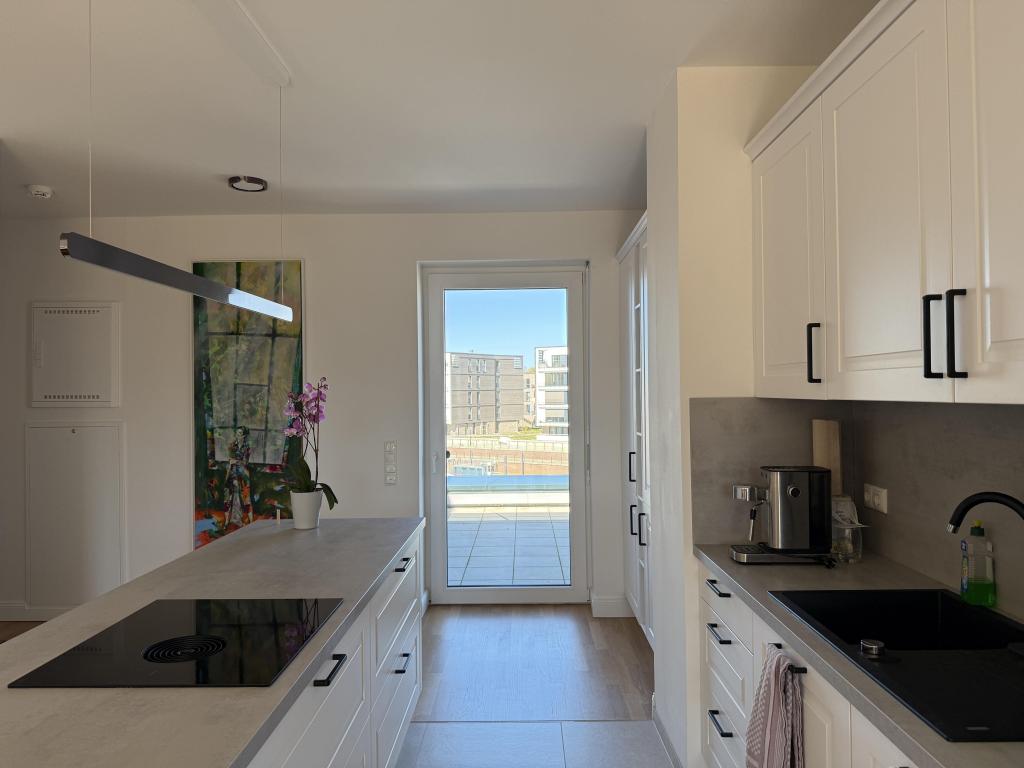 Allerinsel: 2,5-Zimmer-Wohnung mit Einbauküche und zwei Dachterrassen - Foto 5