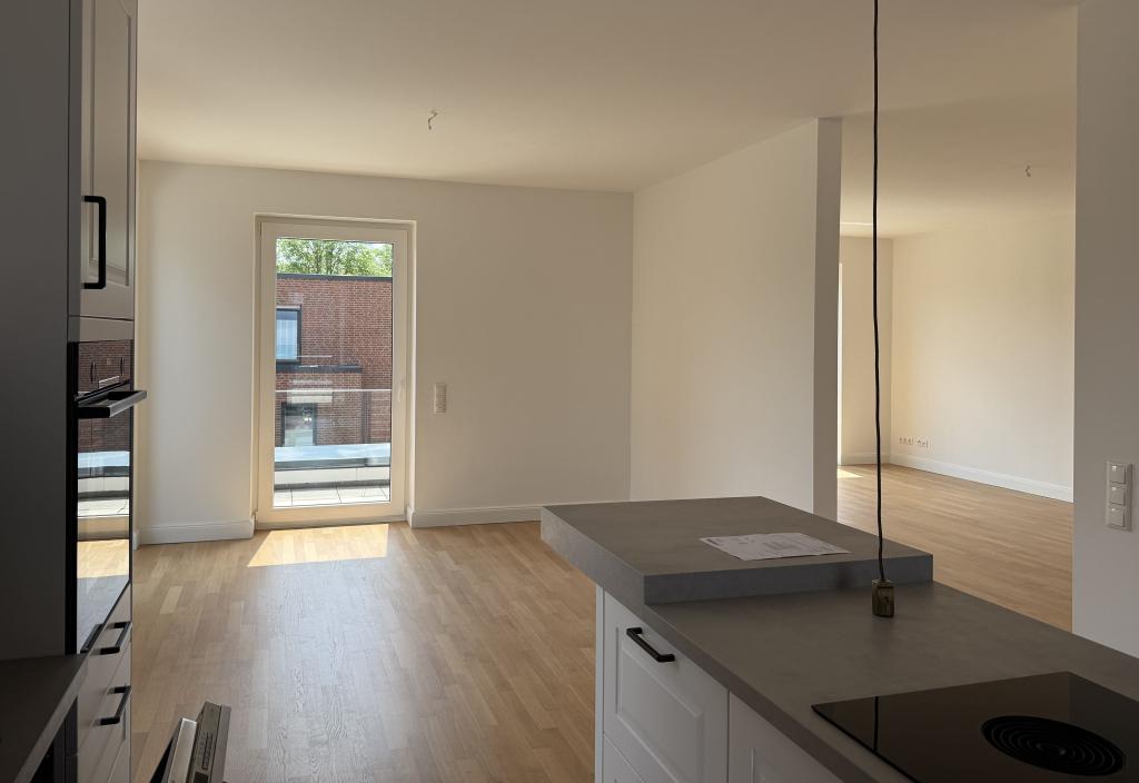 Allerinsel: Moderne 2,5-Zimmer-Wohnung mit Einbauküche und zwei Loggien - Foto 4