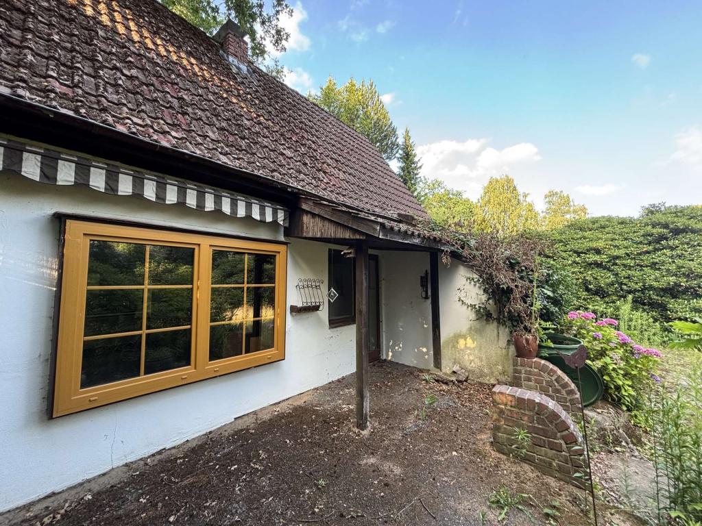Altbestand mit Garage
