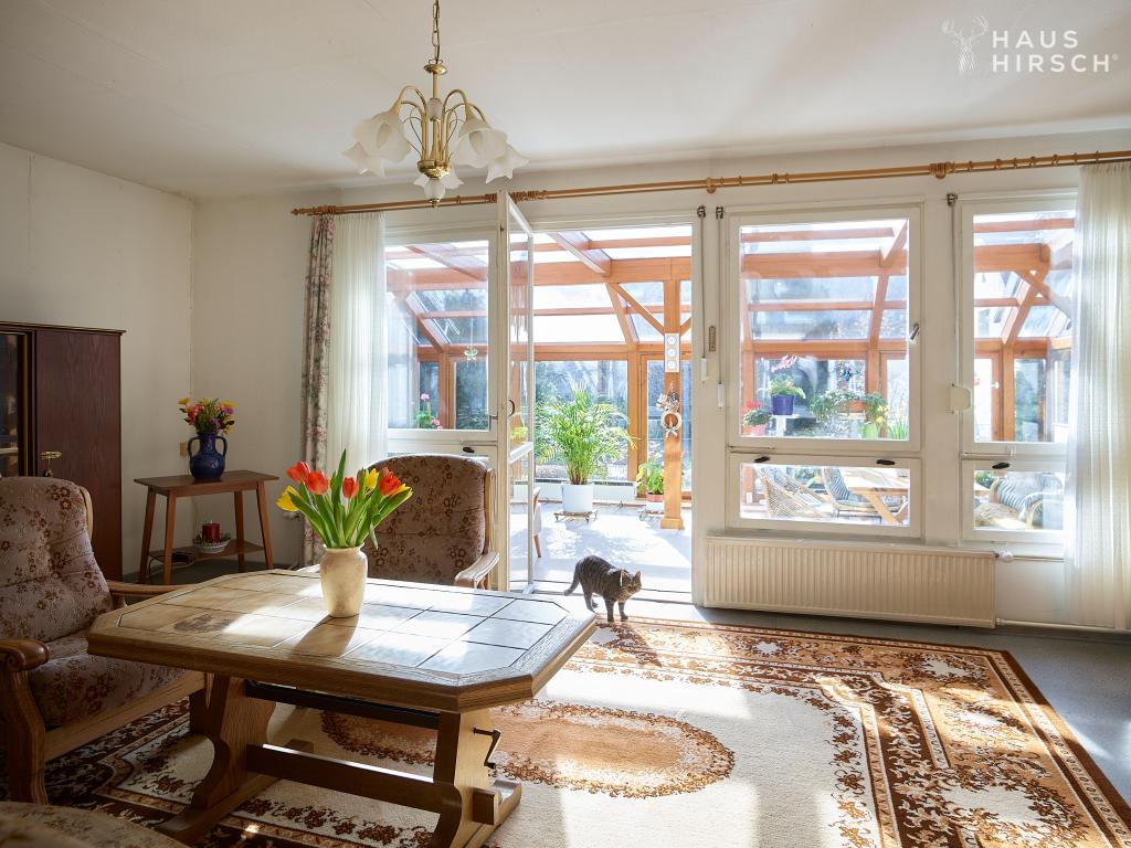 Wohnzimmer mit Wintergarten