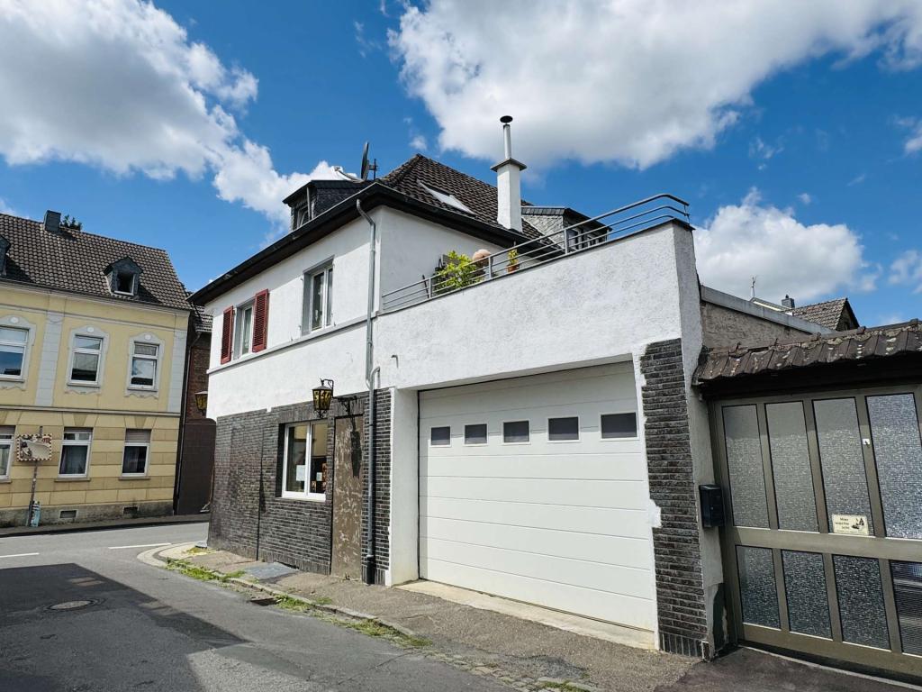 Doppelgarage und Dachterrasse