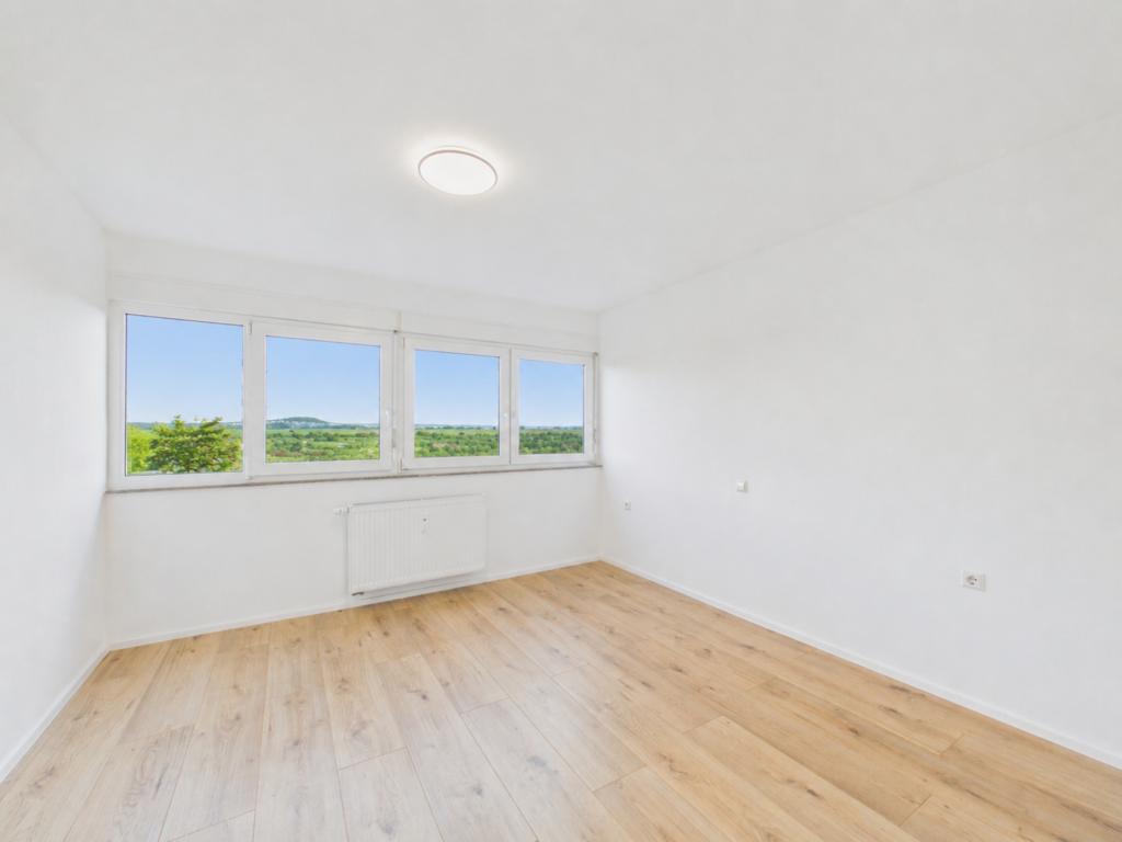 Kernsanierte Wohlfühlwohnung mit zwei Balkonen in begehrter Feldrandlage - Foto 4