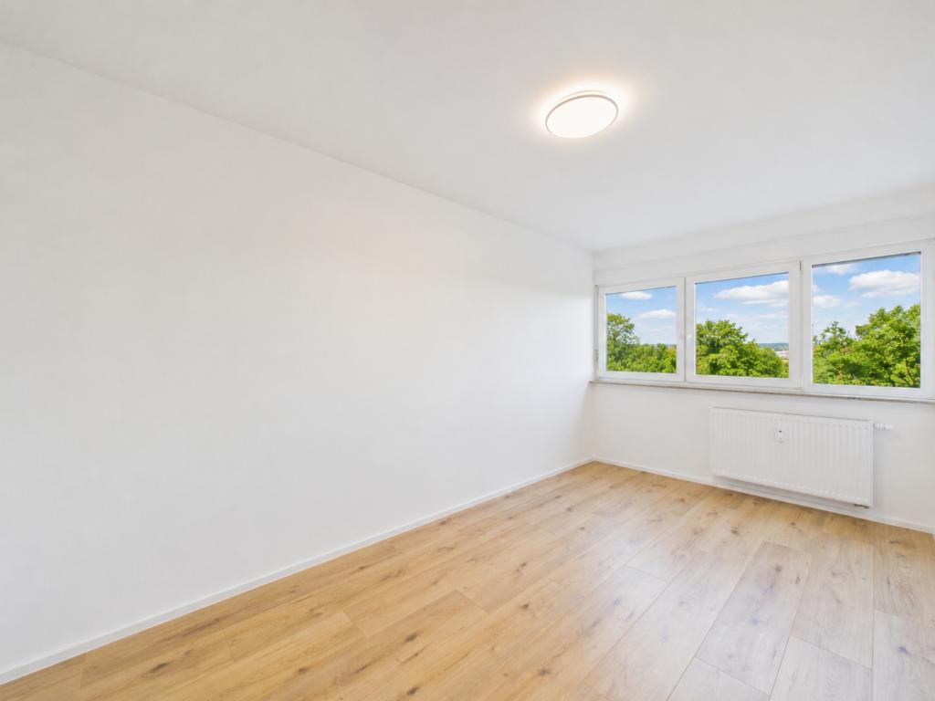 Kernsanierte Wohlfühlwohnung mit zwei Balkonen in begehrter Feldrandlage - Foto 5