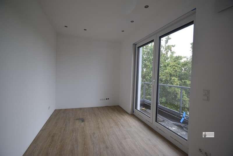 Hoch moderne Penthouse-Wohnung Neubau zum 1.7.2026 Rollläden + Stellplatz + Dachterrasse ohne Küche - Foto 4