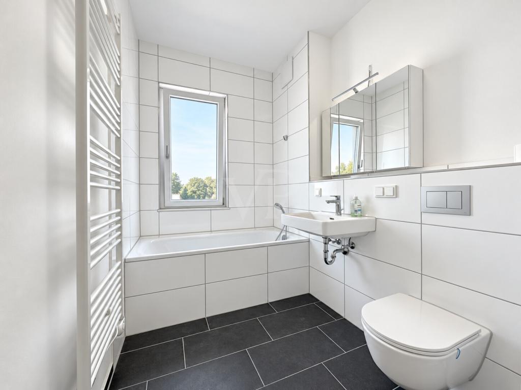 Exklusives Penthouse mit großzügiger Dachterrasse, Loggia und TG-Stellplatz in begehrter Lage - Photo 5