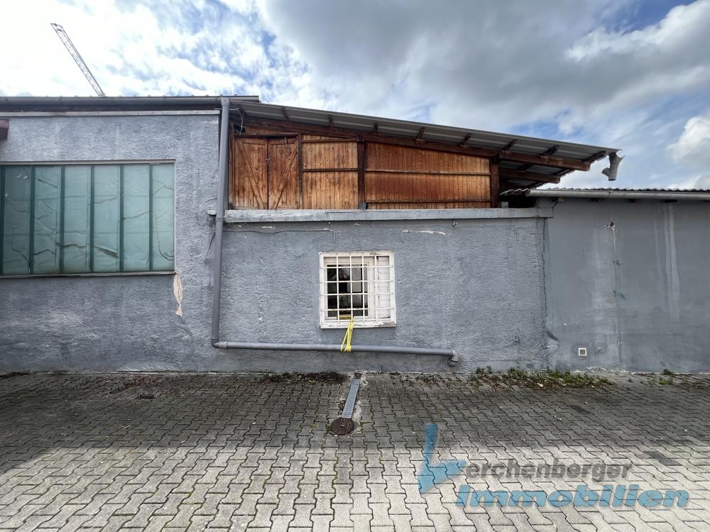 Ansicht mit Anbau und Dachterrasse
