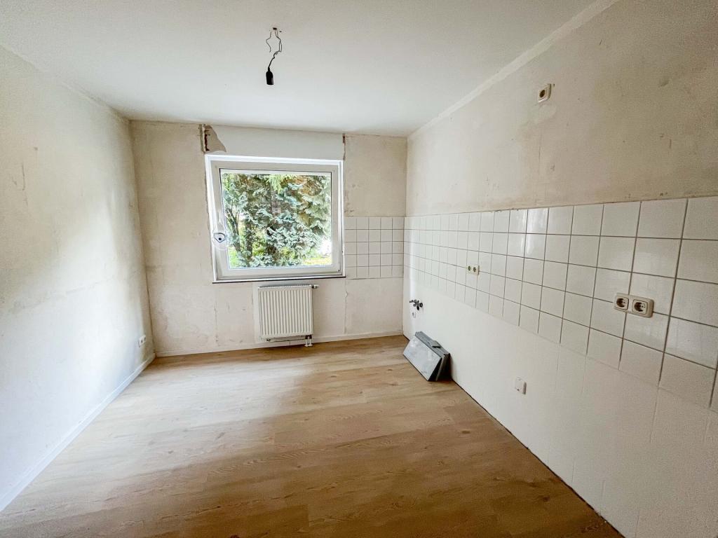 Ideal geschnittene und großzügige Erdgeschosswohnung in zentraler Lage! - Photo 2