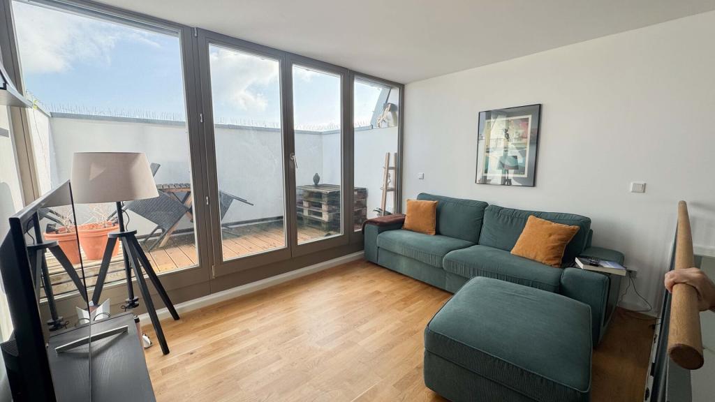 Exklusive 3-Zimmer-Wohnung mit traumhaftem Fernblick und großzügiger Dachterrasse! - Foto 1