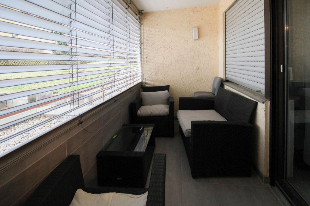 Überdachter Balkon