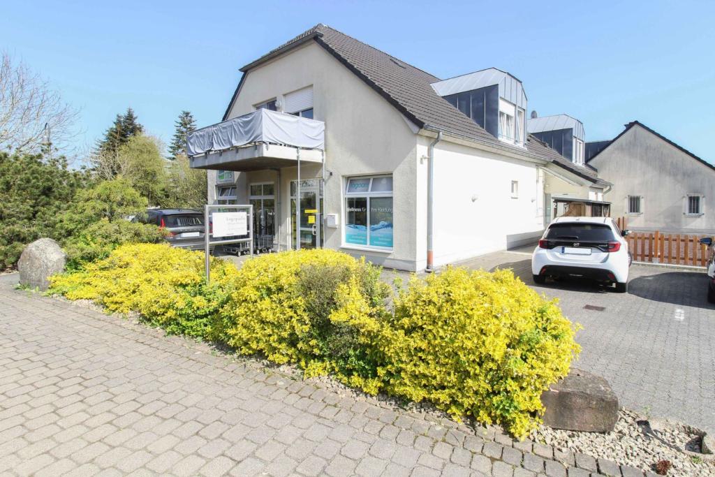 Hausansicht seitlicher Zugang zur den Wohnungen