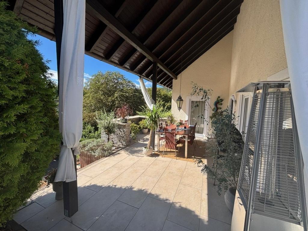 Überdachte Terrasse 1 EG