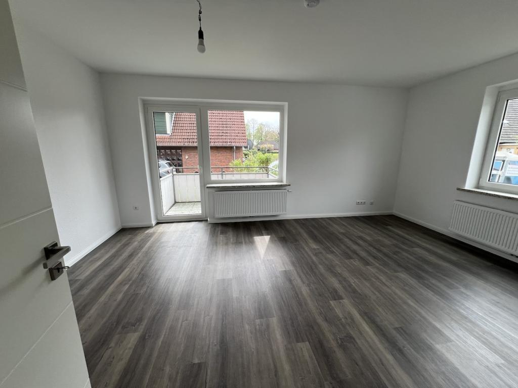 Modern sanierte 1-Zimmer-Wohnung mit Balkon, Einbauküche und Stellplatz in Jever-Rahrdum - Photo 1