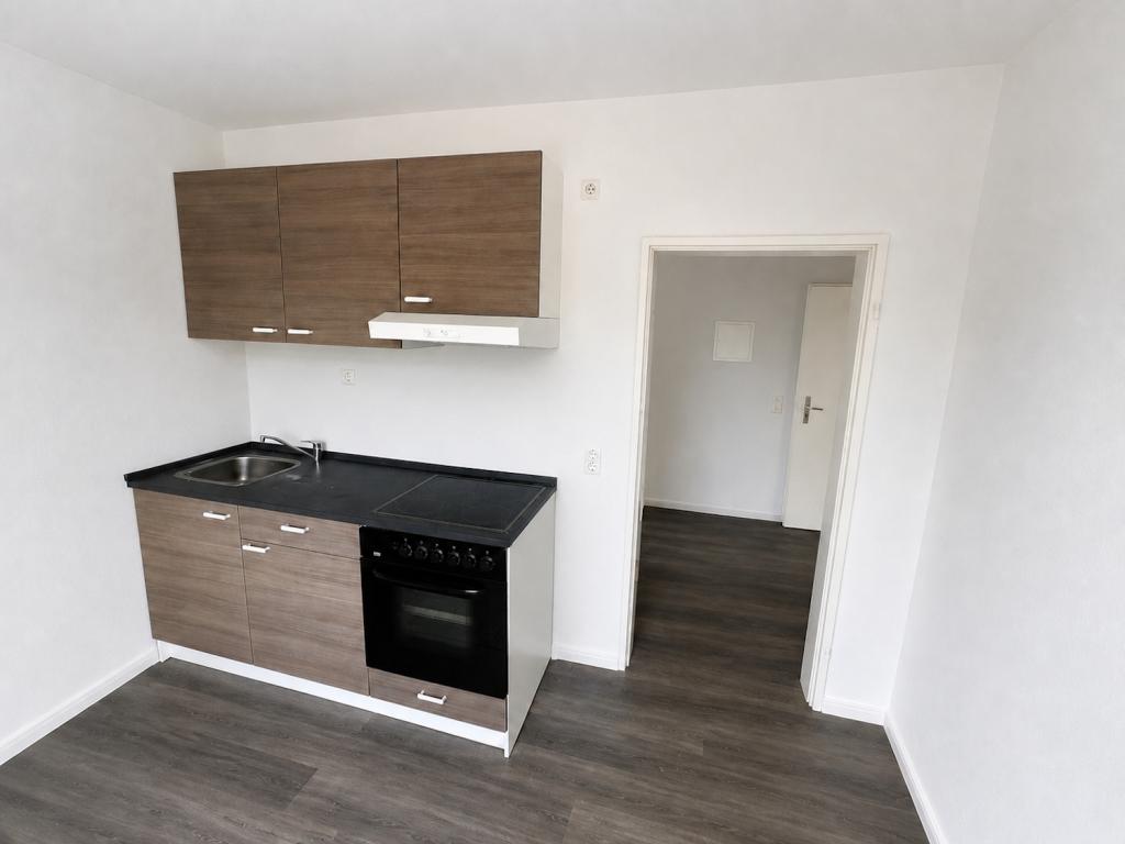 Modern sanierte 1-Zimmer-Wohnung mit Balkon, Einbauküche und Stellplatz in Jever-Rahrdum - Photo 2
