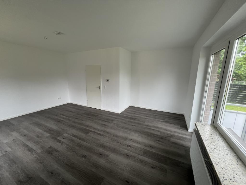 Modern sanierte 1-Zimmer-Erdgeschosswohnung mit Einbauküche und Stellplatz in Jever-Rahrdum - Photo 1