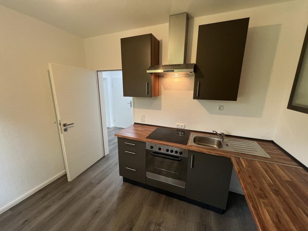 Modern sanierte 1-Zimmer-Erdgeschosswohnung mit Einbauküche und Stellplatz in Jever-Rahrdum - Photo 4