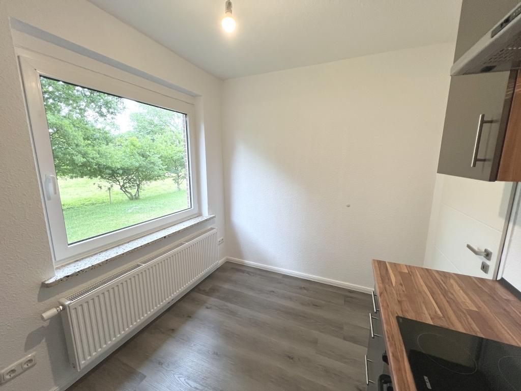 Modern sanierte 1-Zimmer-Erdgeschosswohnung mit Einbauküche und Stellplatz in Jever-Rahrdum - Photo 5