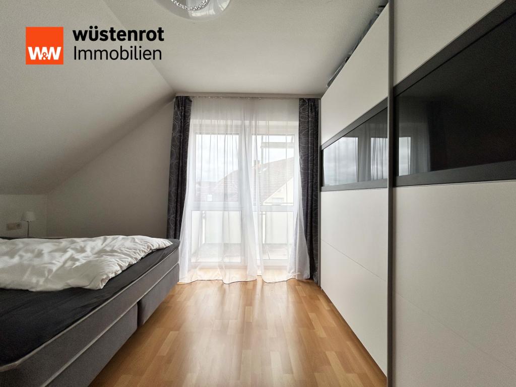 Auch vom Schlafzimmer aus geht es direkt hinaus auf den Sonnen-Balkon