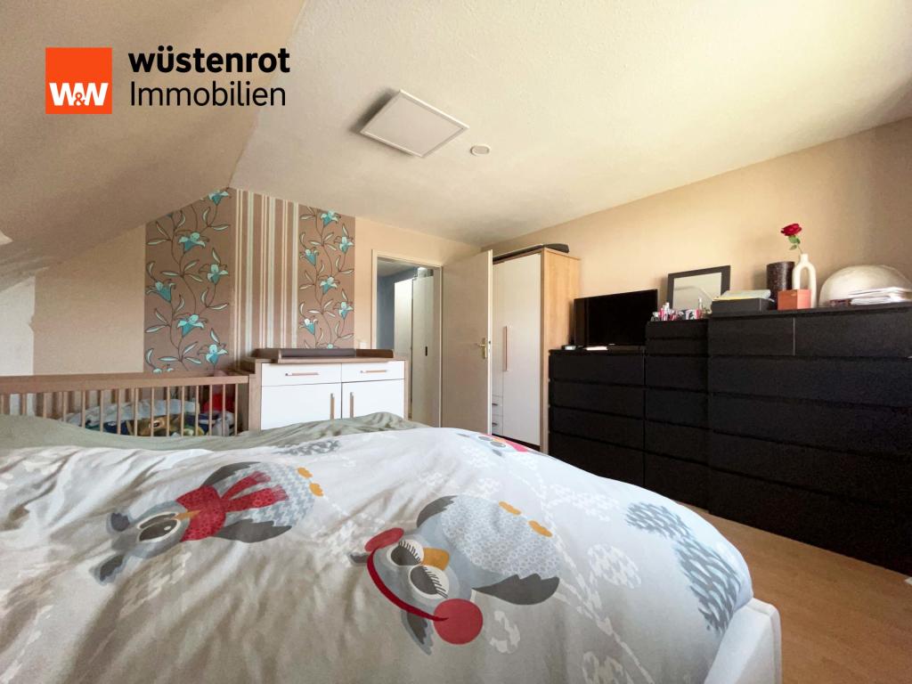 Schlafzimmer 1 mit 15,83 m²: Vertraut und persönlich – ein Zimmer, das Geborgenheit atmet