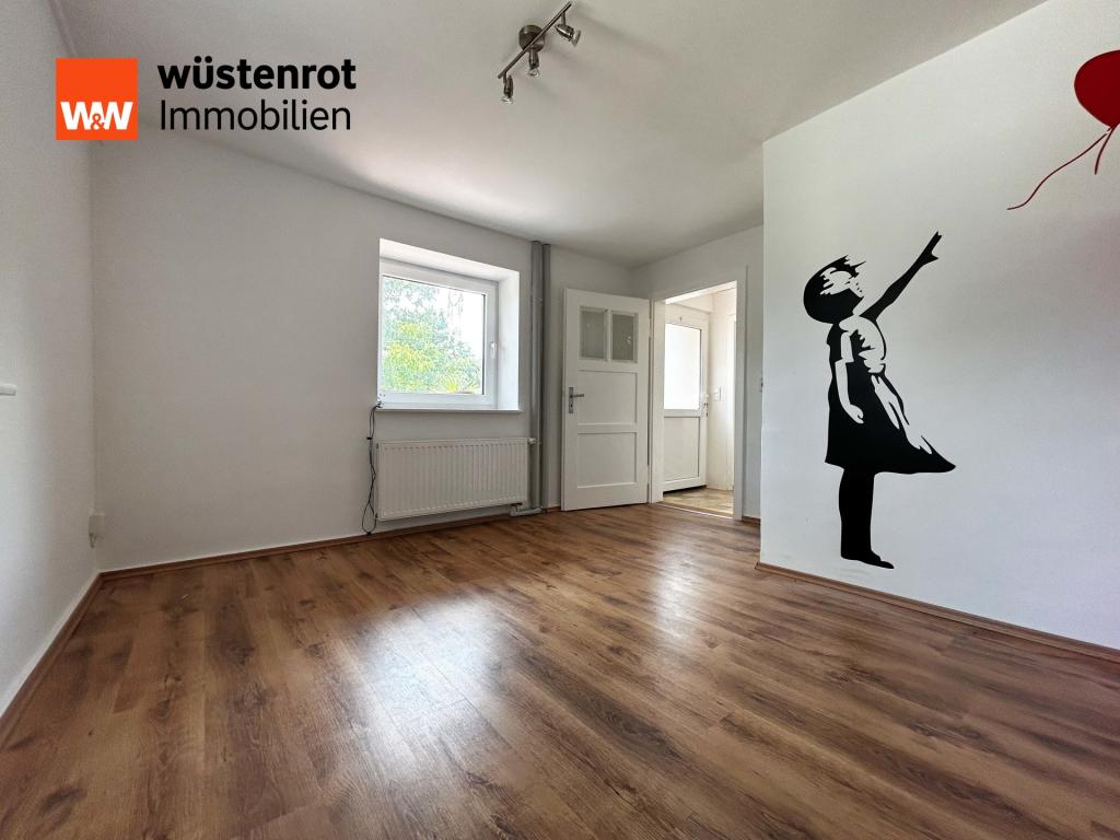 UG - Einliegerwohnung: Wohnraum der Einliegerwohnung...mit Laminatboden und Tageslicht