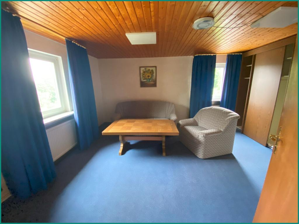 Ein weiteres Wohn- oder Kinderzimmer im Obergeschoss