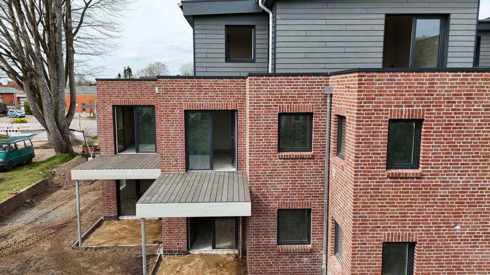 Erstbezug: Moderne Wohnung im 1. Obergeschoss mit Fahrstuhl und Balkon zur Miete - Foto 3